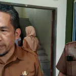 Kepala Puskesmas Garawangi Dr.asikin