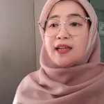 Dr. Hj. Eva Maya Mm